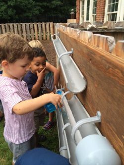 Henri and Adrian with water tube